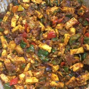 a mixture of tofu and vegetables