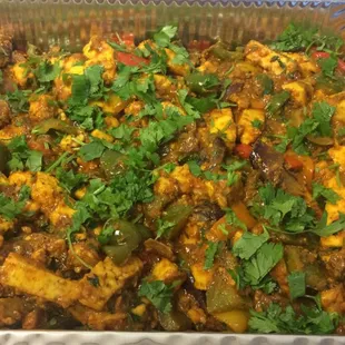 a dish of tofu and vegetables