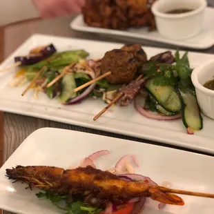 Small Mix Skewers and Onion Fritter &quot;Kyet Twyn Kyaw&quot; (DF)(GF)(V) in the background