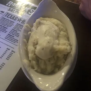 Creamy mashed potatoes with cream white gravy