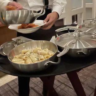 two chefs preparing food