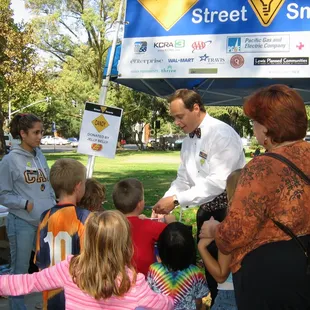 Magicians for kids.    Using magic to teach families how to be street smart when walking and riding their bikes.