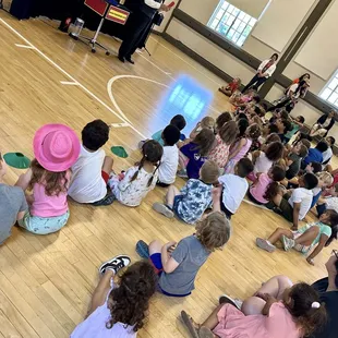 Amazing and amusing the kids at another school show.