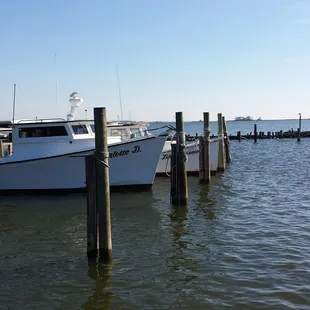 a boat docked at a dock