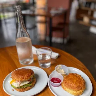 Egg &amp; ham biscuit Sammie with avocado; plain biscuit with house-made seasonal jam (strawberry) &amp; cinnamon butter