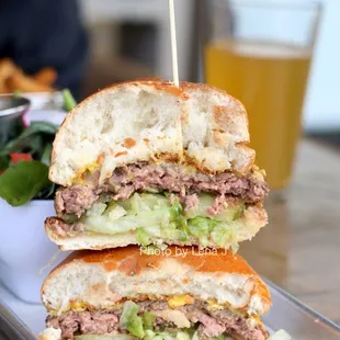 Inside of Diner Burger ($12) - American cheese, lettuce, pickles, sauteed onion puree, mustard, ketchup, on brioche bun