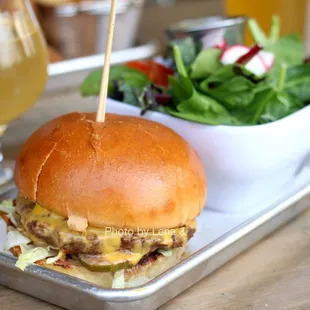 Diner Burger ($12) - American cheese, lettuce, pickles, sauteed onion puree, mustard, ketchup, on brioche bun