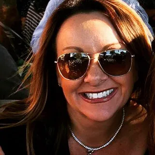 Brandi E.
