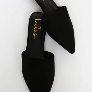 a pair of black slippers