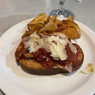 Special of the day wonderful chicken and garlic bread with house chips.