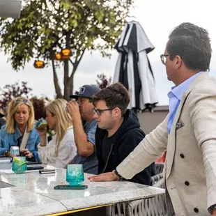 Patrons at the Rare Bird bar.