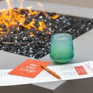 A drink and menu at Rare Bird.