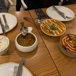 Left to right: coconut rice, kerala chicken curry, kofta curry, butter chicken