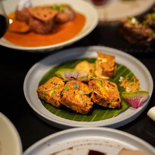 Harissa paneer tikka: watermelon radish, makhni aioli, pickled shallots