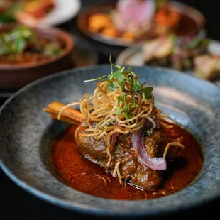 Nalli Rogan Josh - Braised Lamb Shank, Tomato &amp; Kashmiri Chili Curry, Potato Salli