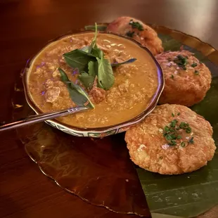 Bergedil w. Kari ayam. Potato fritters with chicken curry.