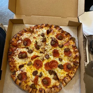 My fiancé and I ordered a medium pizza with pepperoni and sausage. It was perfectly cooked and tasted amazing.