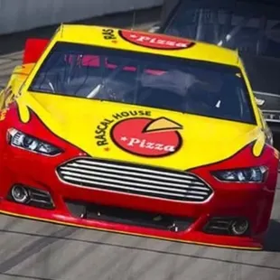 a red, yellow, and red car