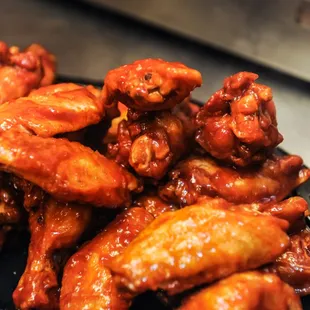a plate of chicken wings