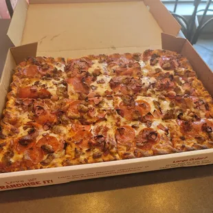 Belly buster meat lovers  A little over $20.