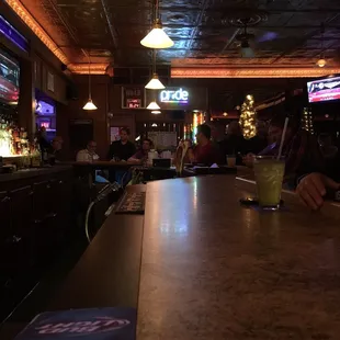 people sitting at the bar
