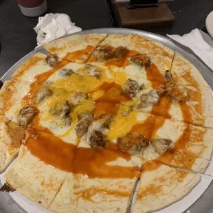 a pizza with meat and cheese