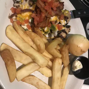 Smothered chicken with steak fries