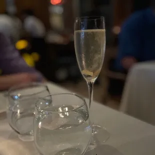 Sparkling wine with ginger syrup and candied ginger