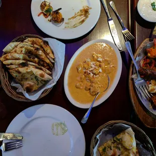 Chicken korma, onion kulcha, garlic naan and mixed tandoori grill