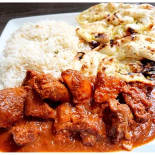Lamb Vindaloo, Basmati Rice &amp; Garlic Naan @ our favorite place.  Always so good!!!  Our waiter Roni is the best!!!