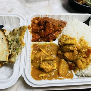 Combo meal with chicken tikka masala and mango chicken with basmati rice.