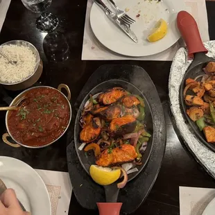 Chicken Vindaloo, Chicken Makhani (Butter Chicken), salmon tikka, Chicken Tikka Masala