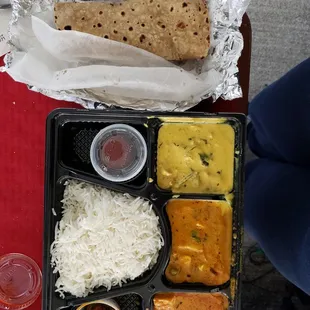 Feb 2022 Special Thali $8.99 3 items, 2 rotisserie, rice, achaar (pickle), 1 gulab jamun. Punjabi Kadi, Navratan Korma, and Shahi Paneer