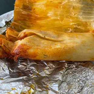 a tamales wrapped in foil
