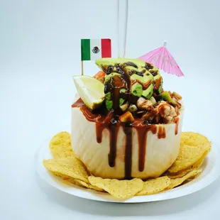 Coco playero! Shirmp fresh lime,cucumbers,tomato,onion,avocado,and special Clamato.