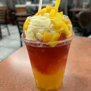 Strawberry and mango raspados with vanilla ice cream
