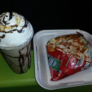 a slice of pizza and a drink