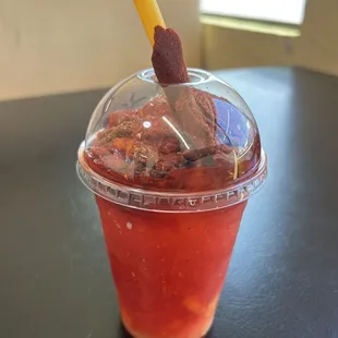 a drink in a plastic cup