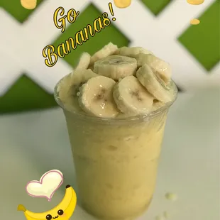 a banana smoothie in a plastic cup