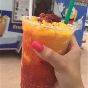 a person holding a drink