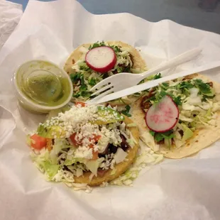 Carne asada sope and two barbacoa tacos.