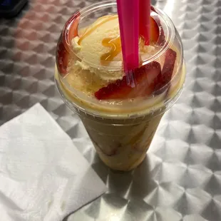 Strawberry Raspa-Nieve : it tastes like a tres leches cake in a cup.