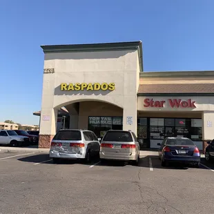 cars parked in front of the store