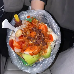 Tostilocos, with big chunks of cucumber and jicama!! Yum!!