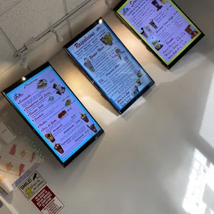 a restaurant menu displayed on a wall