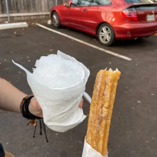 piña colada snowcone and a Churro