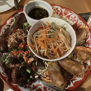 Laos Sampler - jerky, sausage, and spring roll with papaya salad