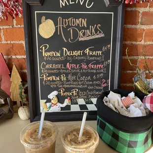 a menu and two drinks