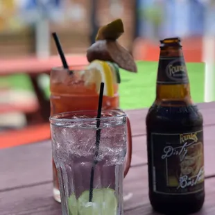 two drinks on a picnic table