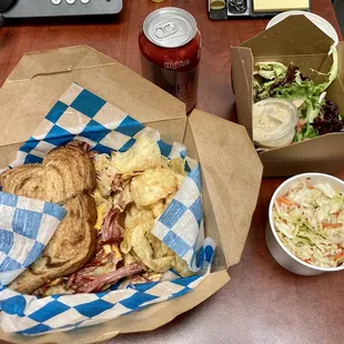 Take out lunch - corned beef Reuben with salad and coleslaw
